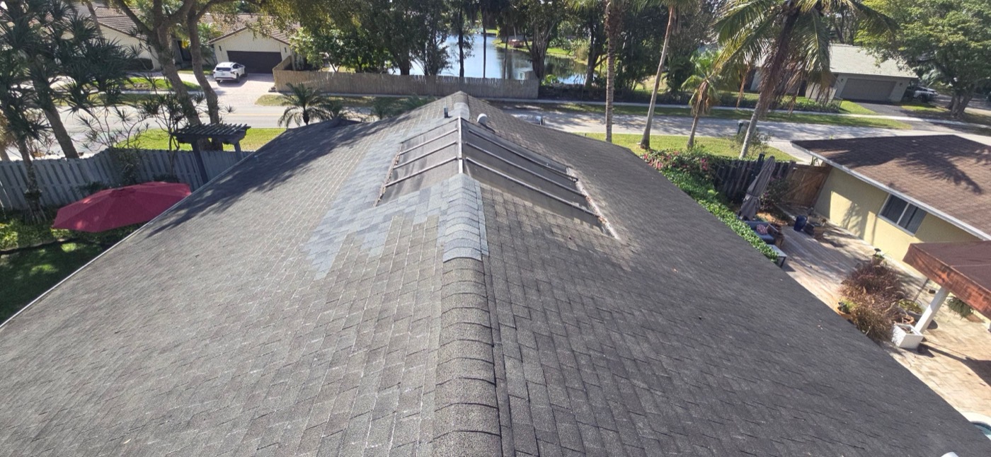 Before — Kaizen Roofing roof replacement in Miami-Dade: Weathered roof prior to full replacement